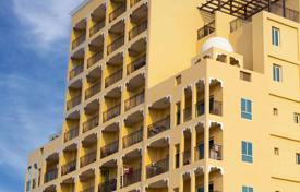 New residential complex with apartments in International City, VAE. ab $238 000