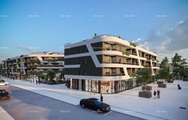 Wohnung Poreč, residential and commercial building under construction with apartments and underground garages. 354 000 €